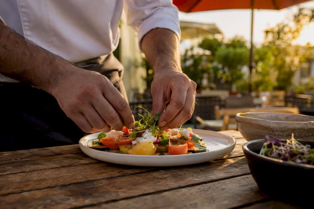 Chef plating dish for food photography
